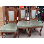 A set of four Edwardian upholstered salon chairs together with a marble topped coffee table