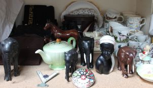 Assorted handbags together with Bushnell ensign binoculars, carved African elephants,