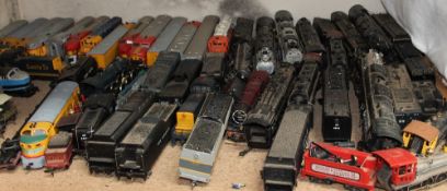 A Rivarossi Locomotive together with other locomotives, carriages,
