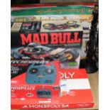 A Tamiya Mad Bull remote controlled car together with a controller, board games, Lima set,