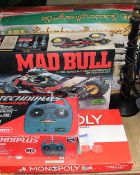 A Tamiya Mad Bull remote controlled car together with a controller, board games, Lima set,