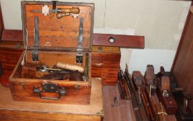 A box of wood planes, together with two wooden tool boxes and tools,