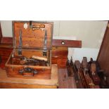 A box of wood planes, together with two wooden tool boxes and tools,