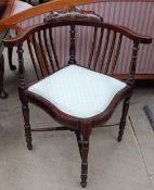 An Edwardian marquetry decorated corner chair