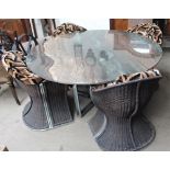 A circular marble topped and chrome dining table,