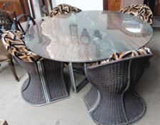 A circular marble topped and chrome dining table,