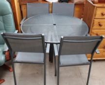 A garden table and four chairs