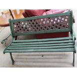 A modern green painted garden bench