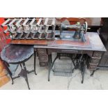 A Singer treadle sewing machine table,