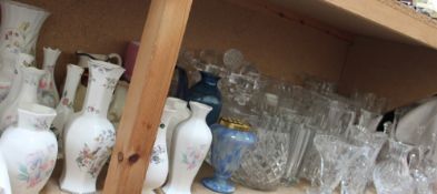 A quantity of Aynsley porcelain vases together with a large quantity of glass decanters, vases,