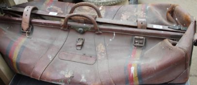 A brown leather cricket bag