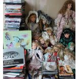 Assorted modern collectors dolls together with records and DVD's