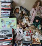 Assorted modern collectors dolls together with records and DVD's