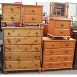 A modern pine chest of drawers together with another pine chest of drawers,