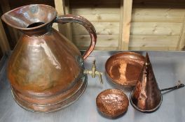 A large copper jug together with a copper bedwarming pan, funnel,