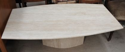 A large marble topped coffee table together with a smaller example