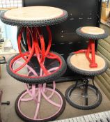 Three occasional tables and a stool constructed from bicycle parts