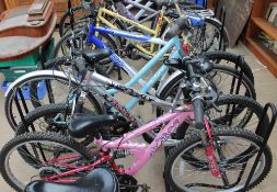 An Apollo XC26 Gentleman's bicycle together with a Raleigh fifth Avenue Lady's bicycle,