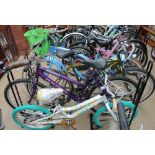An Apollo Blossom Lady's bicycle together with a Falcon Exess Ace bicycle,