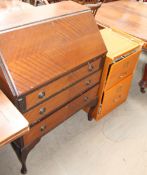 A 20th century mahogany bureau together with a two drawer filing cabinet