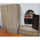 A limed oak wardrobe with matching dressing table,