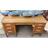 A 20th century oak desk and a glass table top