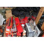 Assorted Hornby Railways carriages, locomotive, water tower, etc, together with a pair of ski boots,