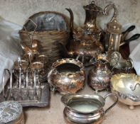 An electroplated four-piece tea service together with other electroplated items etc