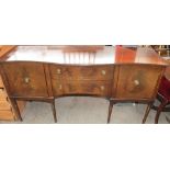 A reproduction mahogany dining table together with six chairs and a sideboard