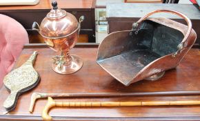 A copper coal scuttle together with a bellows,