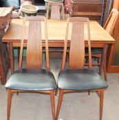 A Koefoeds Danish teak extending dining table and four chairs