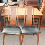 A Koefoeds Danish teak extending dining table and four chairs