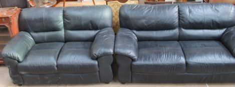 A leather three-piece suite comprising a three seater settee,