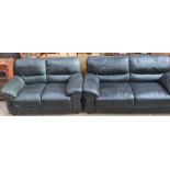 A leather three-piece suite comprising a three seater settee,