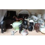 Assorted handbags together with Bushnell ensign binoculars, carved African elephants,