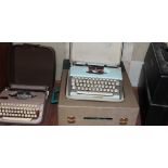 A Schiedecker typewriter together with other typewriters etc
