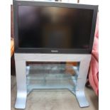 A Panasonic Viera 32” flat screen television on a stand (Sold as seen,