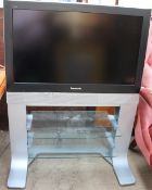 A Panasonic Viera 32” flat screen television on a stand (Sold as seen,