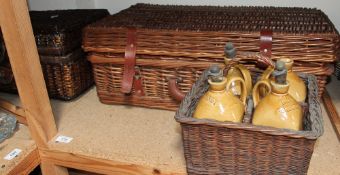 A set of four stoneware decanters for Brandy, Irish Whiskey,