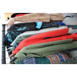 A collection of Vintage clothes and outfits including furs etc