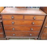 A 19th century mahogany chest with two short and three long graduated drawers on turned feet