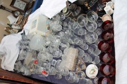 Assorted drinking glasses, glass bowls,