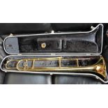 A Bundy trombone, cased, together with a Melody Maker trumpet, cased,