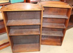 A pair of oak bookcases together with three carvers