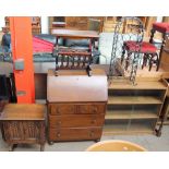 An oak side cabinet together with an oak bureau, magazine rack, bookcase,