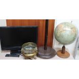 A Bush flat screen television (Sold as seen, untested) together with a standard lamp,