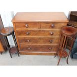 A Victorian mahogany chest with two short and three long drawers on a plinth base together with two