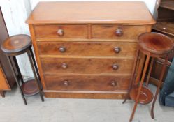 A Victorian mahogany chest with two short and three long drawers on a plinth base together with two