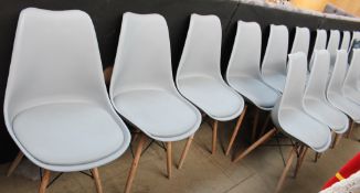 A set of seventeen grey plastic cafe chairs