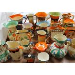 Assorted Myott & Son pottery jugs painted in oranges,